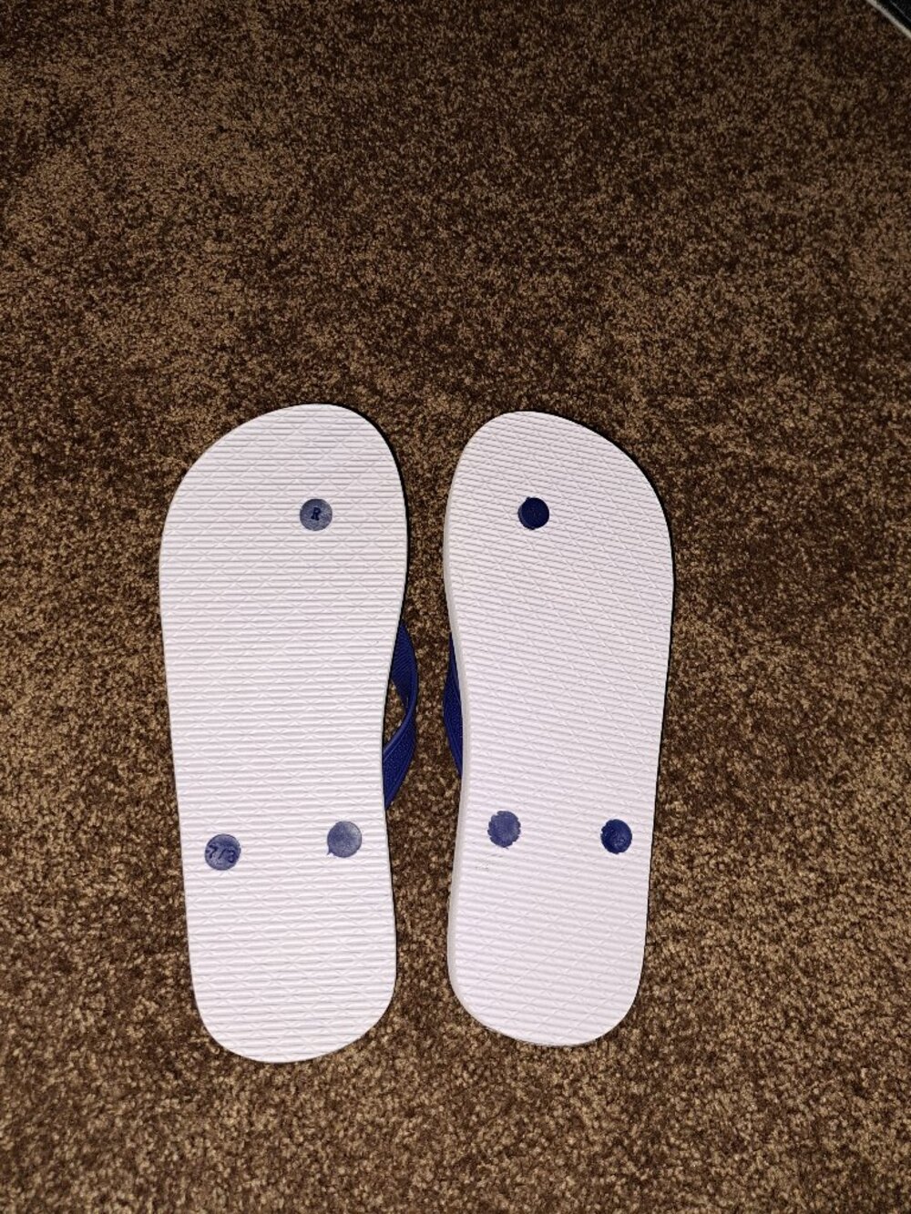 Corona Extra flip-flops featuring a tropical palm tree&beer bottle graphic sole - Picture 2 of 5